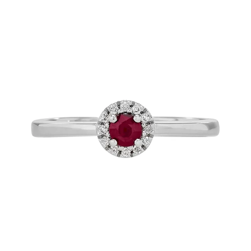 Anillo en oro blanco de 18 Kilates, con rubí central de 0.23 Ct y decoración en diamantes de 0.06 Ct